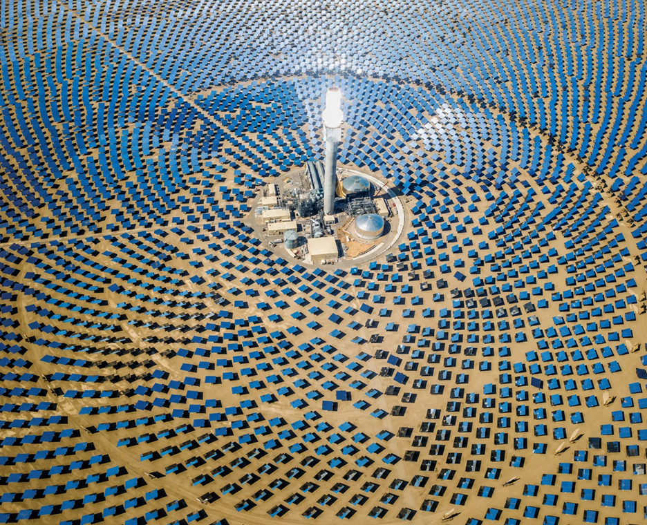 Parabolic mirrors focus the sun’s rays to a receiver on the top of a tower.